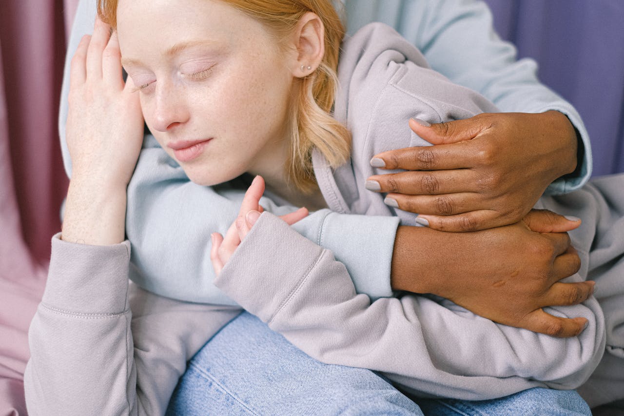 Person holding another person in a safe way